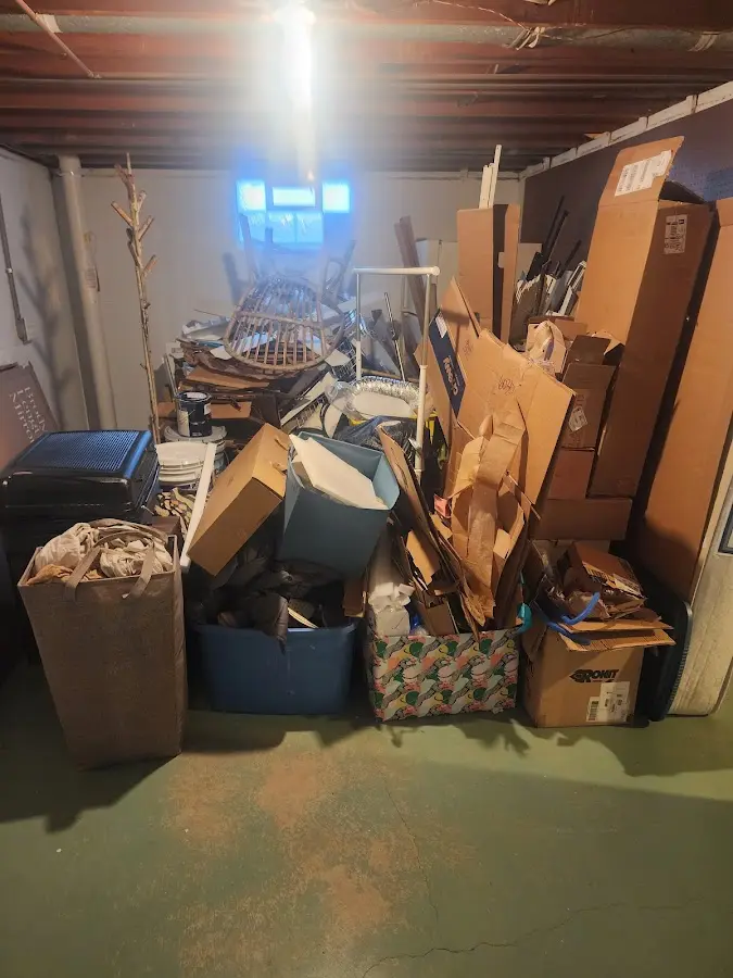 Roll-off dumpster container at job site for Yard Waste Dumpster Rental in East Camden